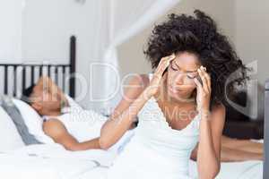 Young woman suffering from headache