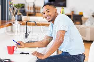 Portrait of happy man with bills