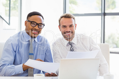 Businessmen holding a report