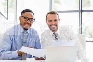 Businessmen holding a report