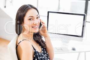 Businesswoman talking on mobile phone