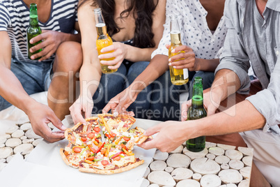 Friends having a pizza