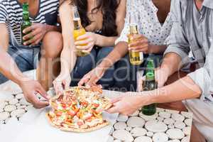 Friends having a pizza