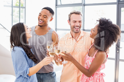 Friends toasting wine glasses