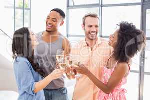 Friends toasting wine glasses