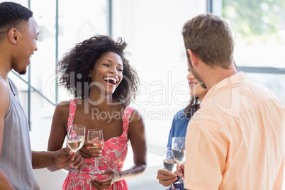 Friends toasting wine glasses