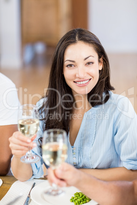 Young woman holding a glass of wine