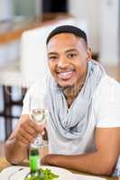 Man holding a glass of wine