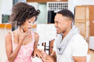Man gifting finger ring to her woman