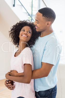 Young couple looking at each other and embracing