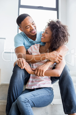 Young couple looking at each other and embracing