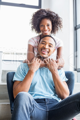 Young couple embracing on steps