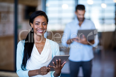 Young woman using digital tablet