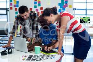 Graphic designers working at their desk