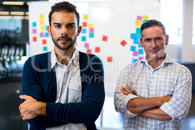 Man with arms crossed looking at camera Man with arms crossed looking at camera