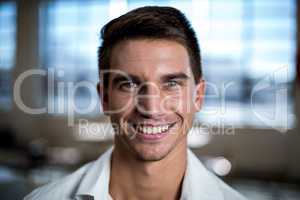 Young man smiling at camera