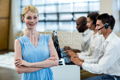 Team working on computer with headset