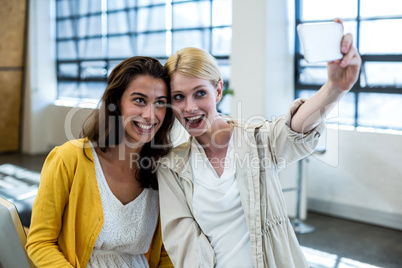 Happy Colleagues taking a selfie