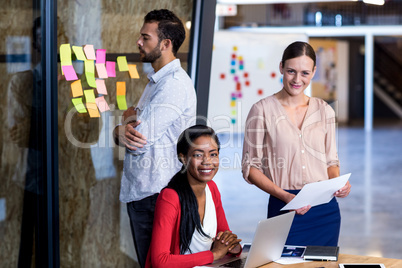 Team of colleagues at their desk