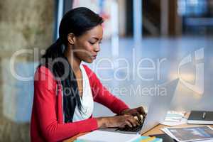 Young woman using laptop