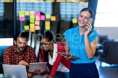 Young woman talking on mobile phone