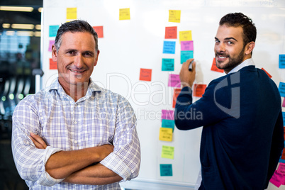 Colleagues smiling at camera