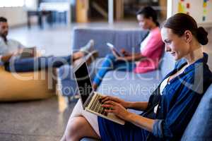 Young woman using laptop`