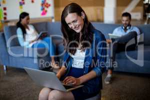 Young woman using laptop