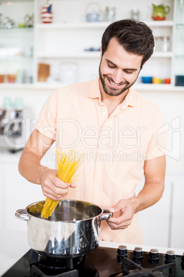 Man cooking spaghetti