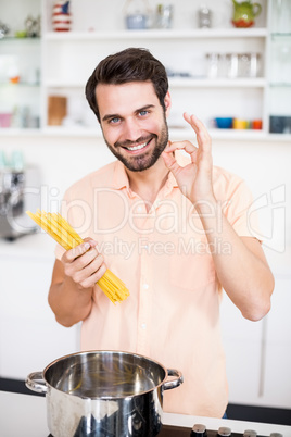 Man cooking spaghetti