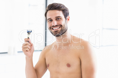 A Man is holding razor