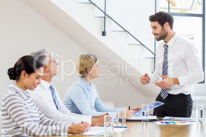 Business colleagues discussing in a meeting