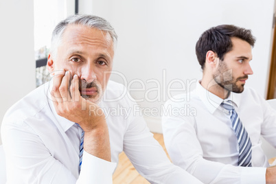 Bored businessman in a meeting