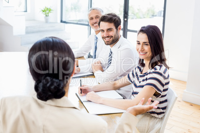 Business colleagues discussing in a meeting