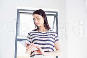 Young woman using digital tablet