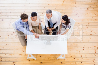 Business people sitting at desk