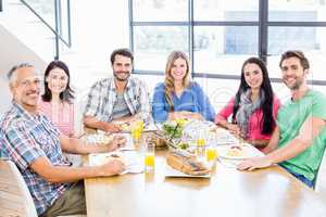 Family having a lunch and smiling