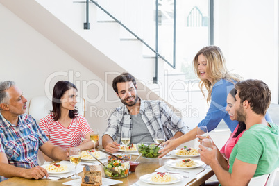 Friends having meal together
