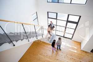 Real estate agent showing new house to couple