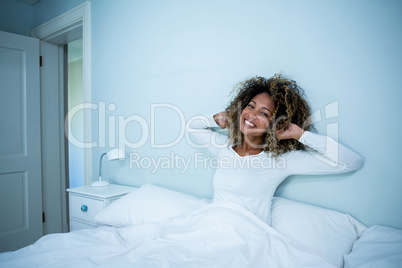 Woman waking up in bed