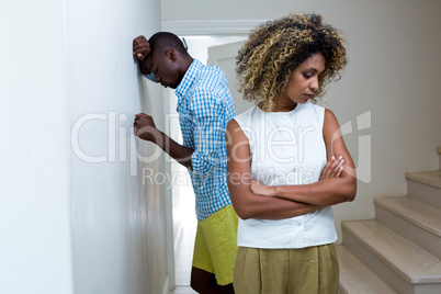 Upset couple ignoring each other after fight