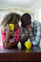 Romantic couple having coffee together