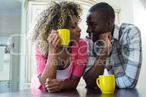 Romantic couple having coffee together