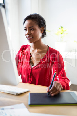 Woman working on her graphics tablet