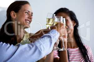 Colleagues toasting champagne flutes