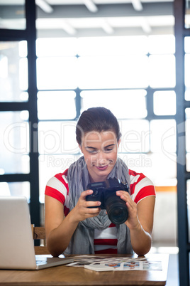 Woman checking photo in camera