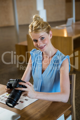 Woman checking photo in camera