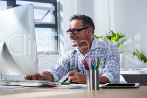 Man working on his graphics tablet