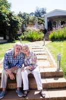 Senior couple embracing in the garden