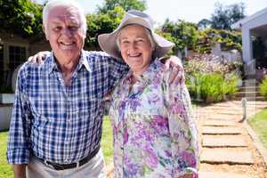 Senior couple embracing in the garden